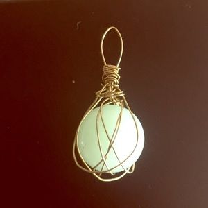 Pale green gem with Copper Wire Pendant…